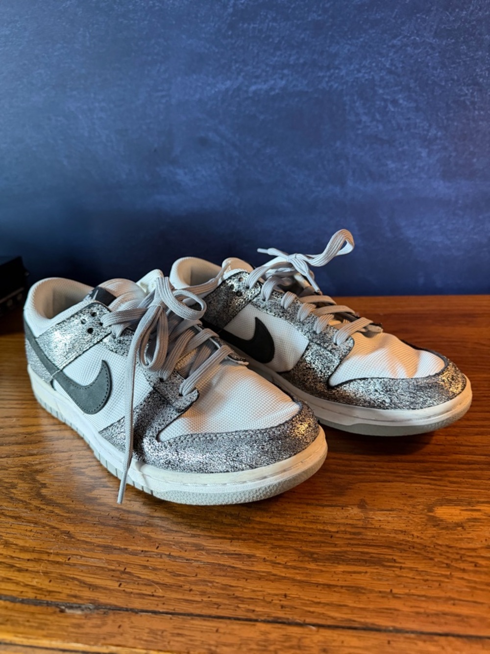 Nike White and Metallic Silver Low-Top Sneakers with Black Swoosh